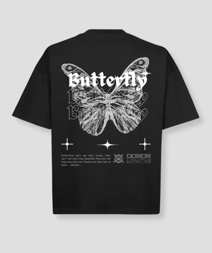 Chemise blanche oversize à motif papillon.png