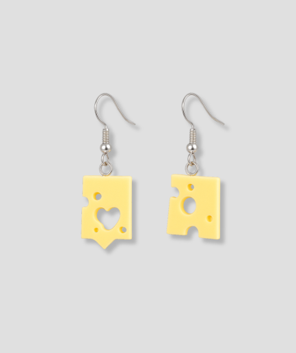 boucle d'oreille en forme de fromage.png