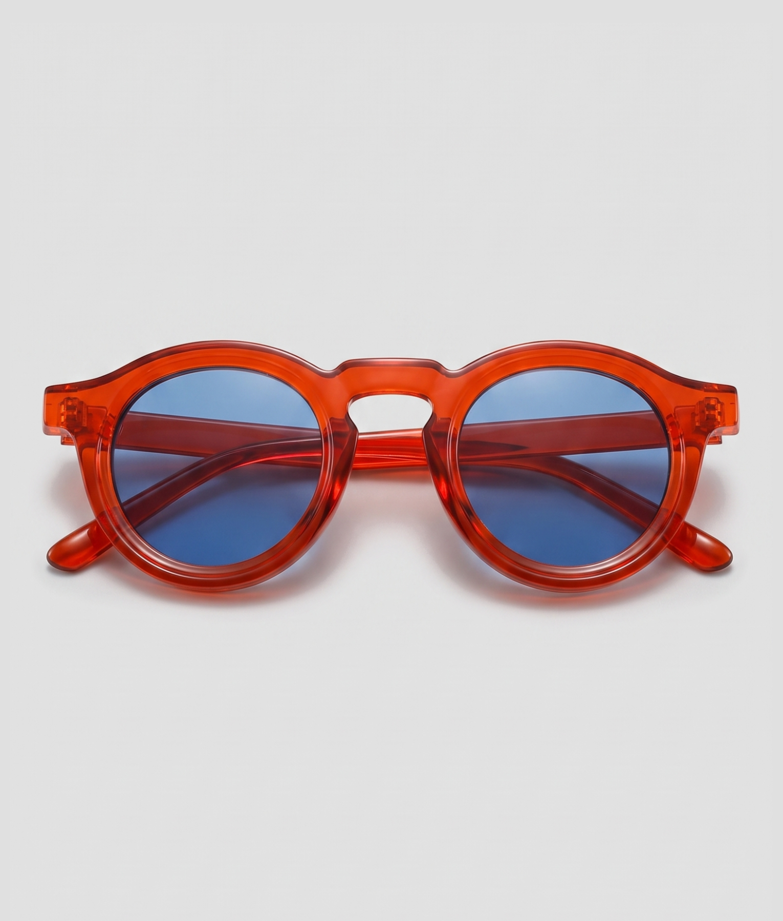 Nagiso, montuur oranje, glas blauw